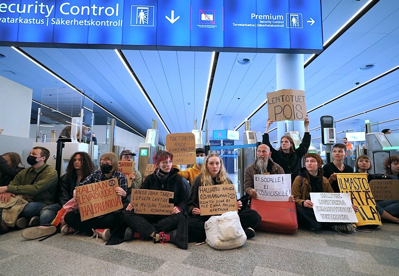 EXTINCTION REBELLION FINLAND BRINGS OVERCONSUMPTION REBELLION TO HELSINKI-VANTAA AIRPORT